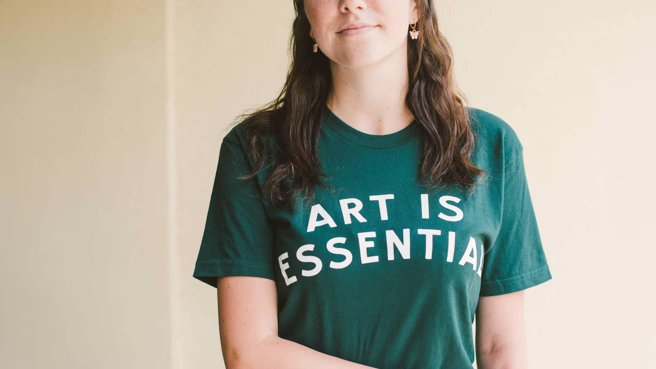 women wearing a green t-shirt