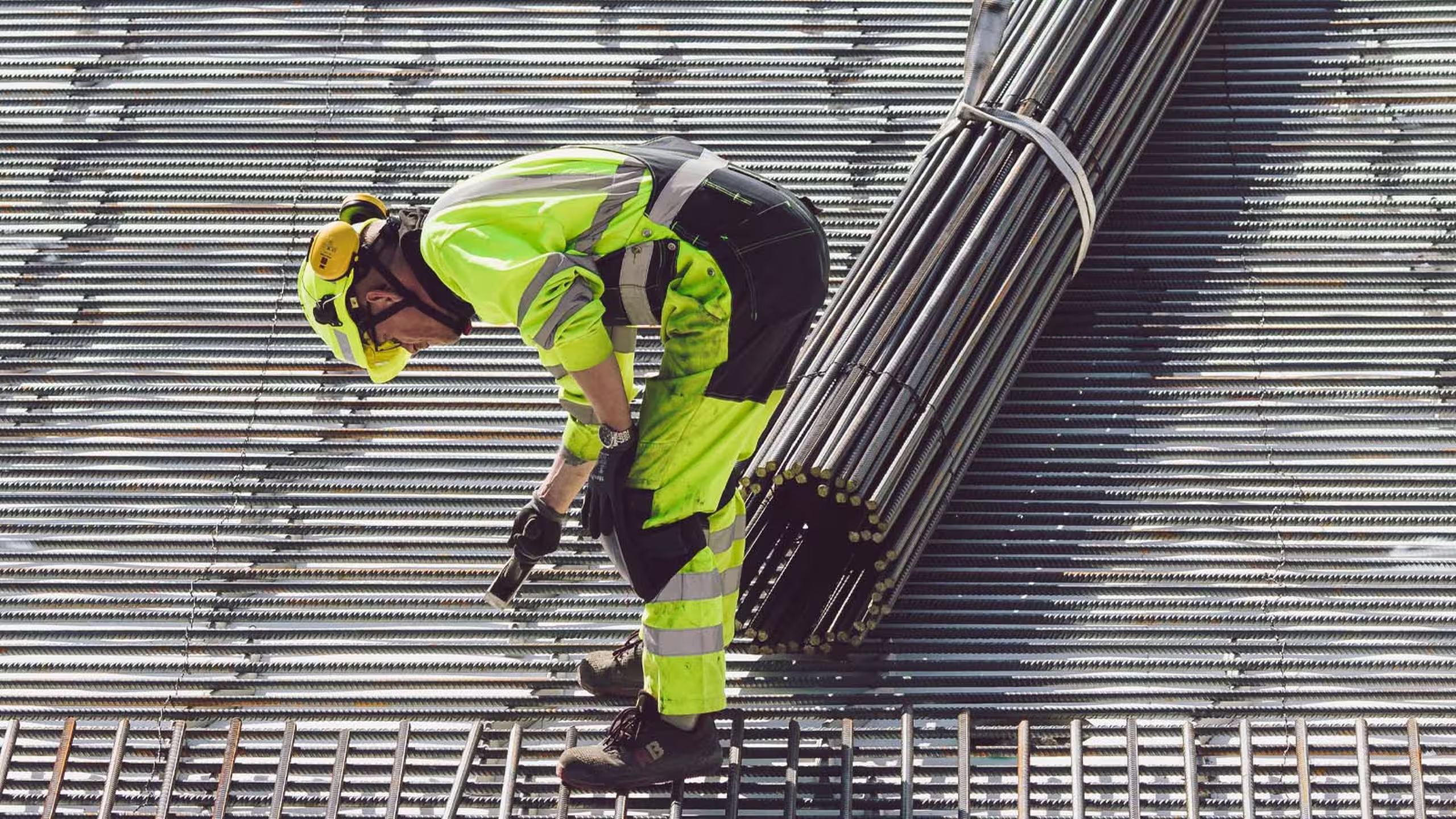 construction worker laying rebar 